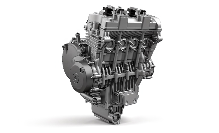 Three-quarter illustration of a motorcycle engine with a metallic casing, upper cylinder assembly and black side cover.