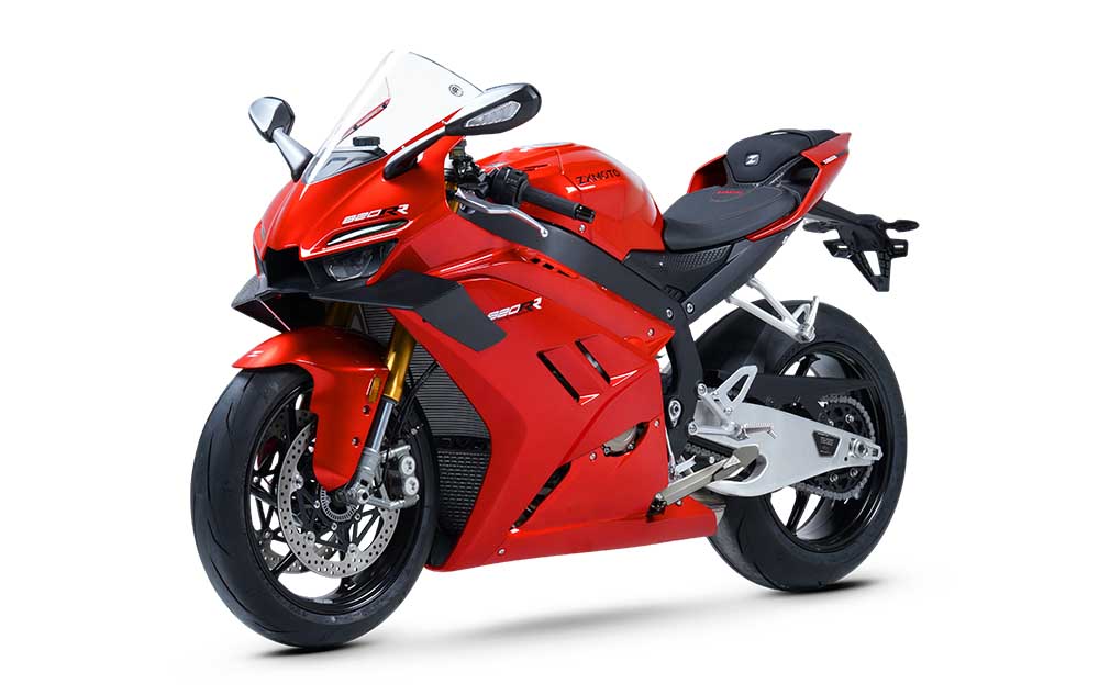 Red ZXMOTO 820RR sport motorcycle with a clear windscreen, angular fairings and gold front forks, angled left.