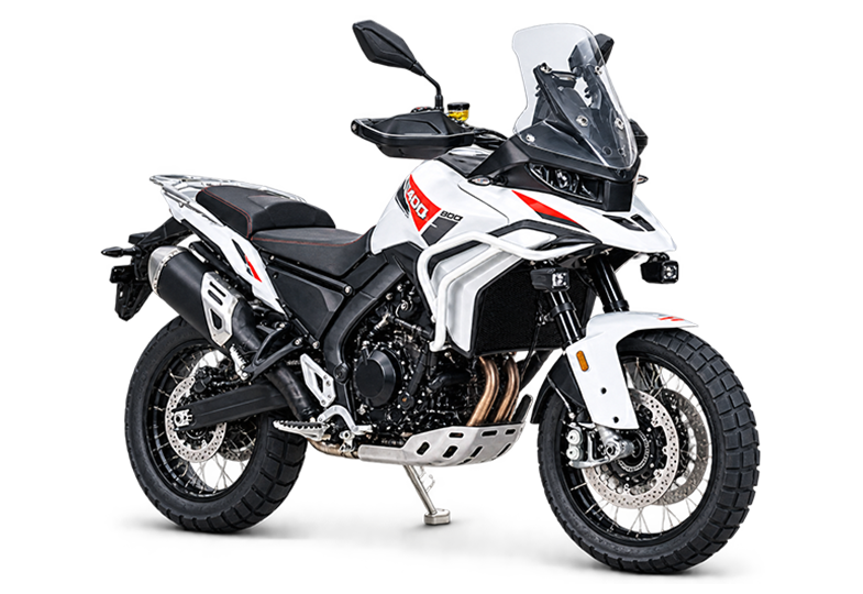 White and red ZXMOTO 820X adventure motorcycle with crash bars and spoked wheels, angled to the left.