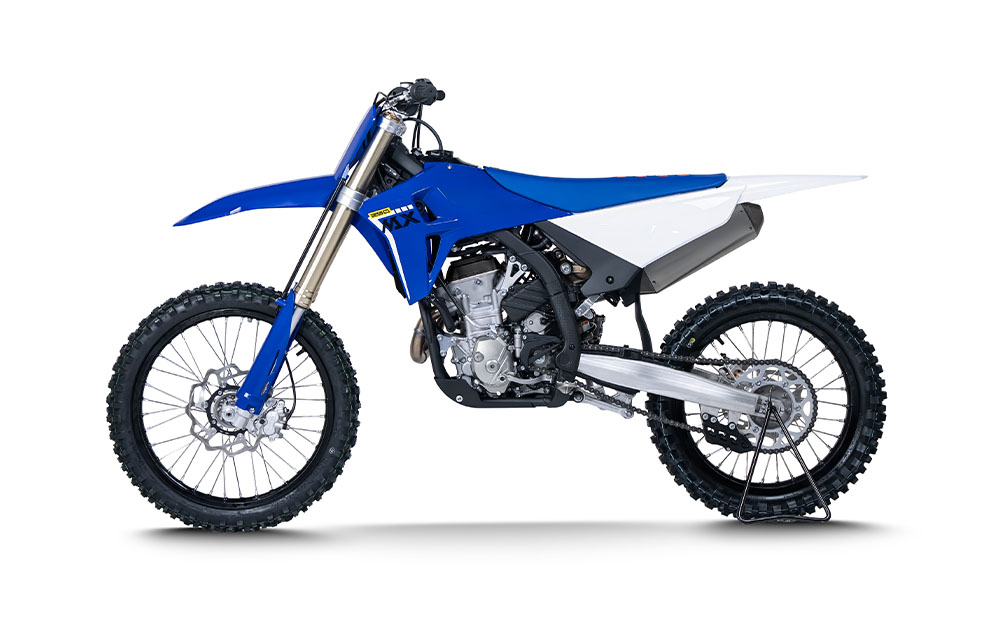 Blue and white ZXMOTO MX250 shown in a left-facing side profile against a white background.